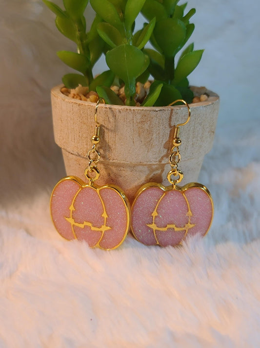 Pink pumpkin face earrings